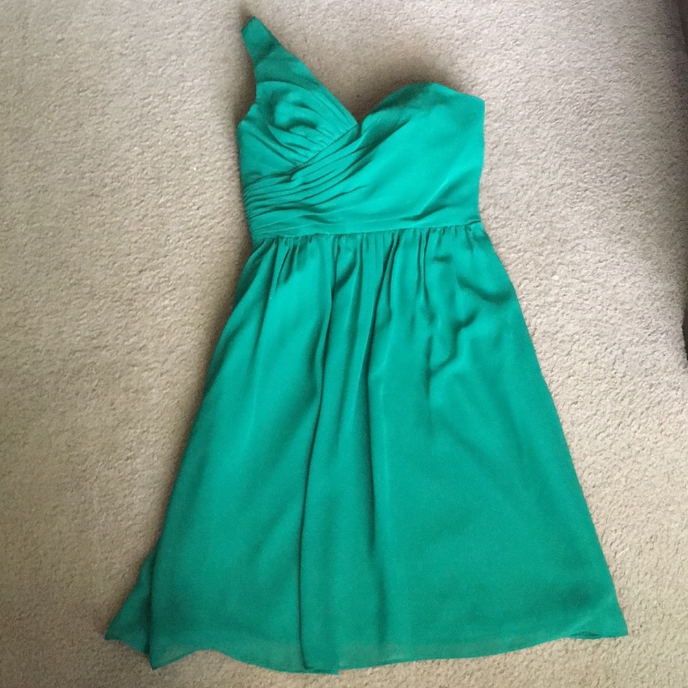 Emerald green one-shoulder dress